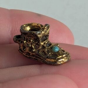 Antique gold baby bootie bracelet or necklace charm, highly detailed
